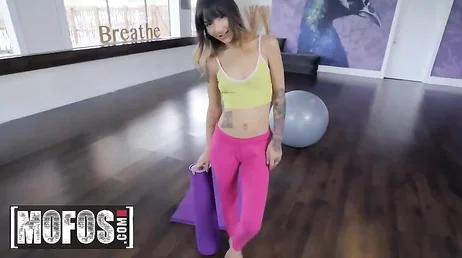 The mature yoga instructor gropes the young student.